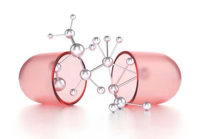 Red capsule with molecular structure