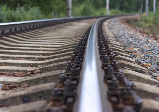Railway rails and sleepers close-up.