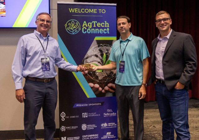Phil Kozera (left) and Dustin Petrik (middle) graduated from the Combine Incubator at the 2024 AgTech Connect Conference.