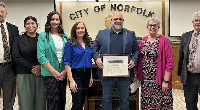 Norfolk Public Works Director Steve Rames, City Attorney Mel Figueroa, Economic Development Coordinator Brooke Anderson, Economic Development Director Candice Alder, Mayor Shane Clausen, DED Director of Field Services Sheryl Hiatt, and Norfolk Finance Officer Randy Gates